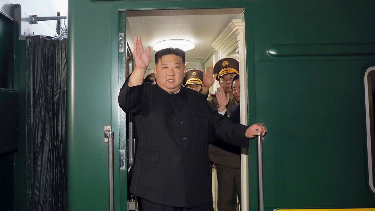 Kim Jong Un waving