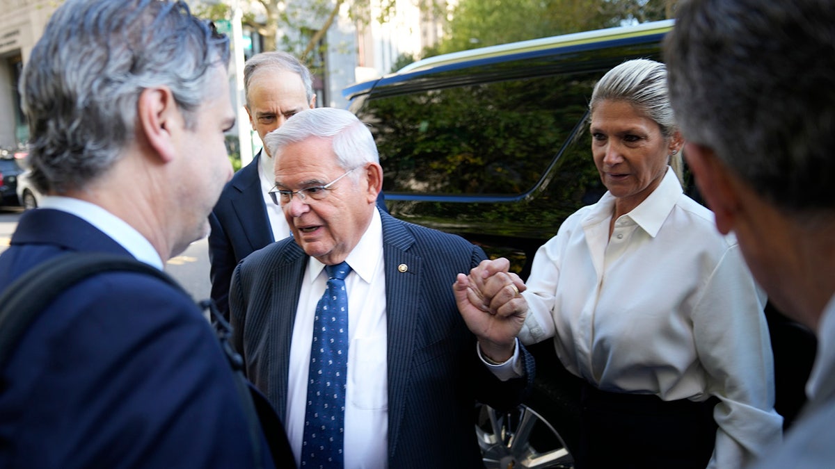 Bob and Nadine Menendez exit SUV at NYC court