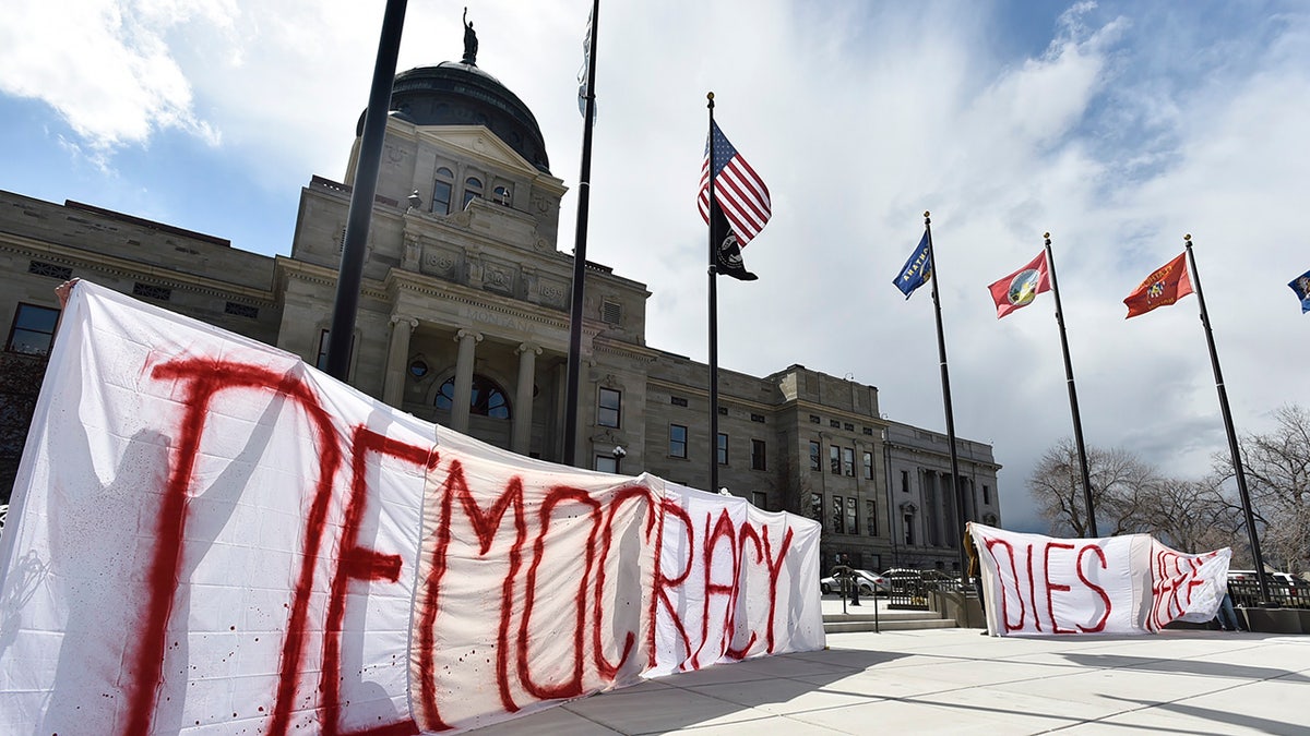 Democracy dies here sign at Montana state capitol