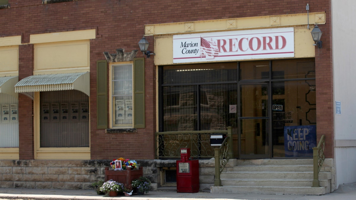The offices of the Marion County Record weekly newspaper sit across the street from the Marion County, Kan., Courthouse, Aug. 21, 2023, in Marion. The police chief who led a highly criticized raid of the small Kansas newspaper is suspended, the mayor confirmed to The Associated Press on Saturday, Sept. 30. Marion Mayor Dave Mayfield in a text said he suspended Chief Gideon Cody on Thursday, Sept. 28.