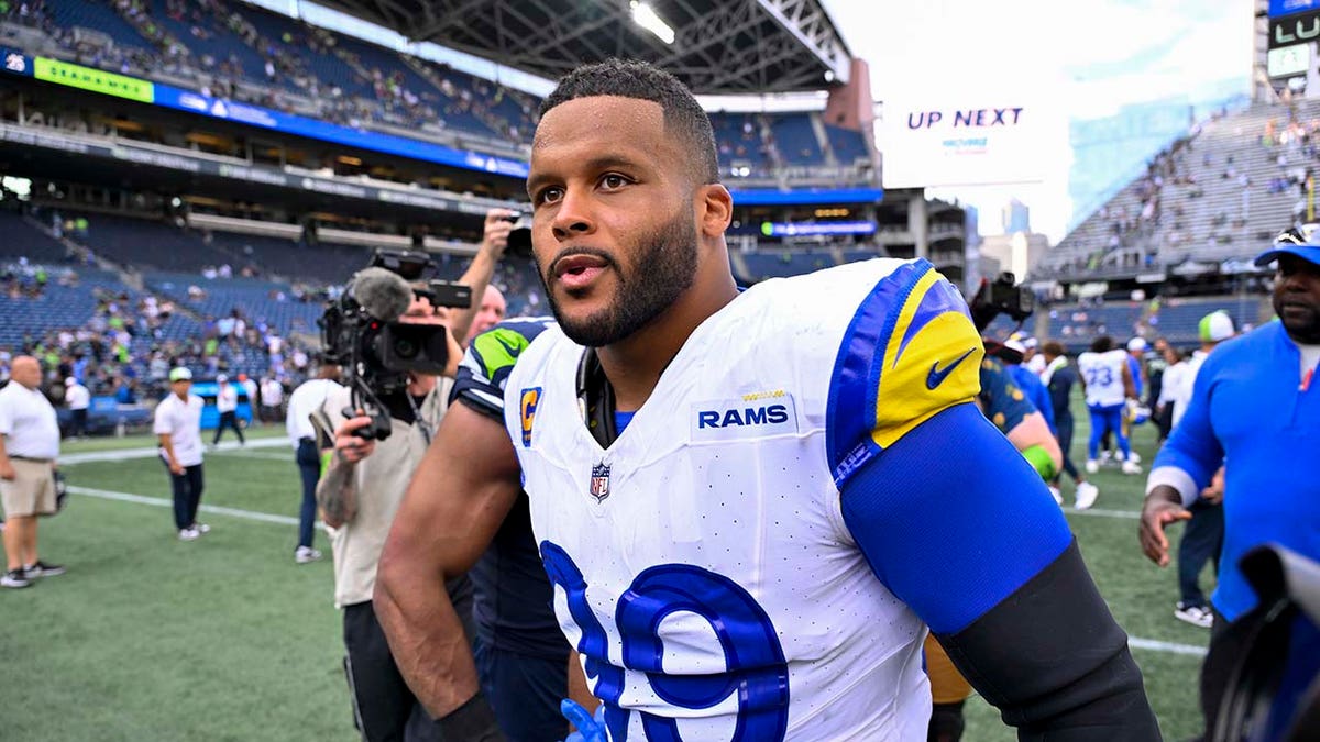 Aaron Donald looks on after a game