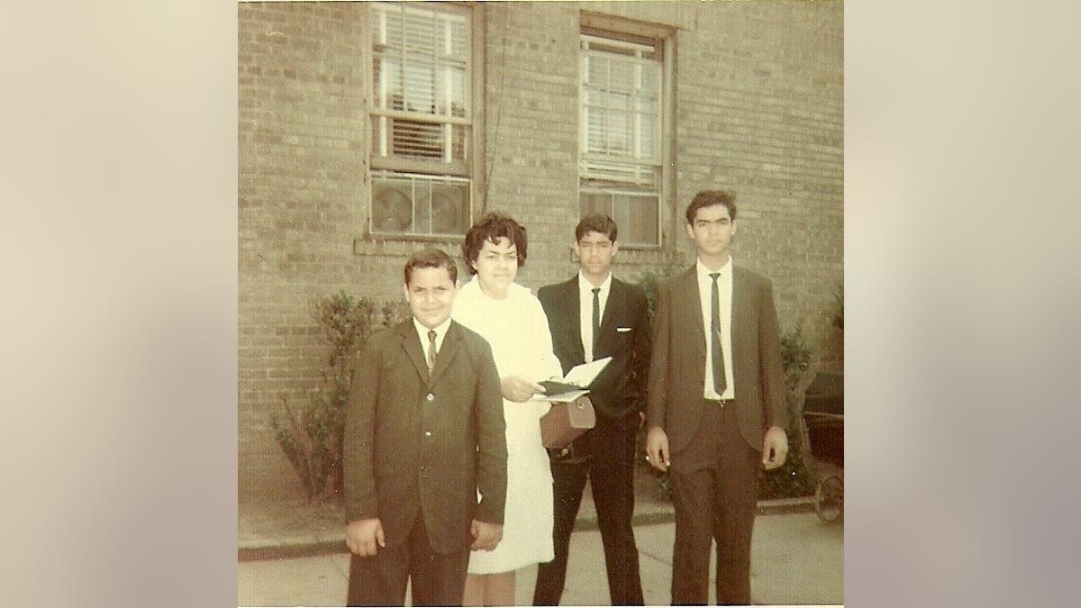 Alex Sanchez with his mother and brother (162)