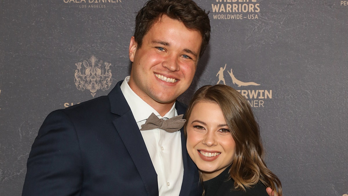 Chandler Powell and Bindi Irwin smiling together