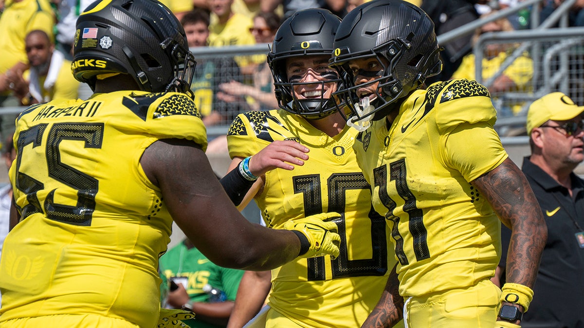 Bo Nix celebrates