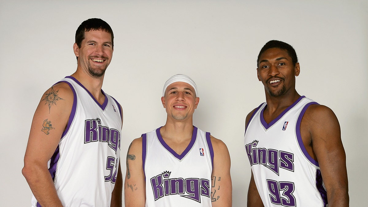 Brad Miller, Mike Bibby and Ron Artest take media day photo