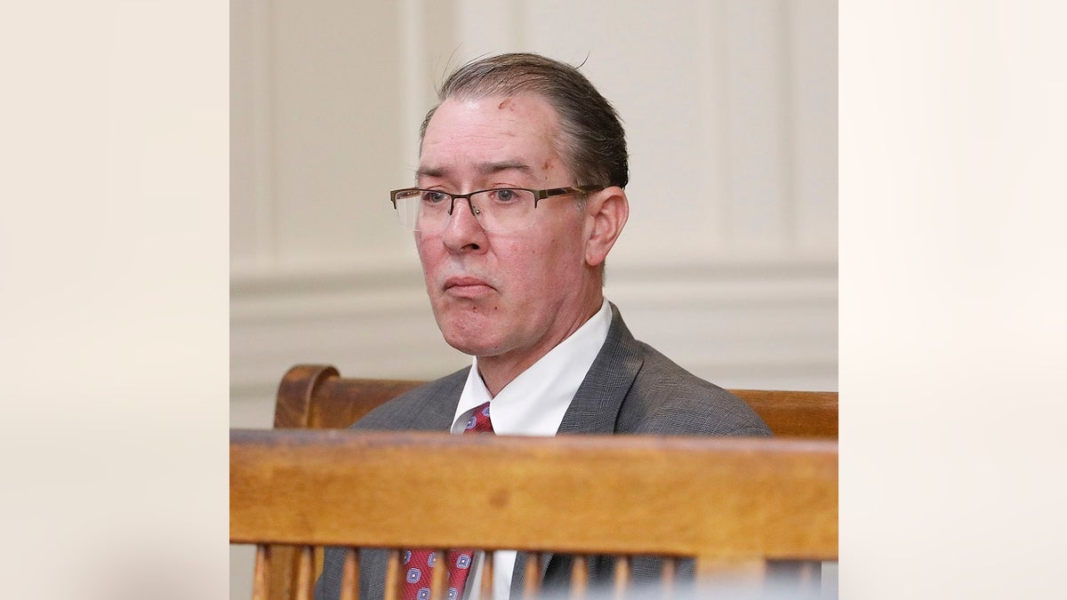 Bradley Rein sits in a Brockton, Massachusetts courtroom on April 23 where he was arraigned for charges related to allegedly driving into an Apple Store and killing one person and injuring more than two dozen others. 