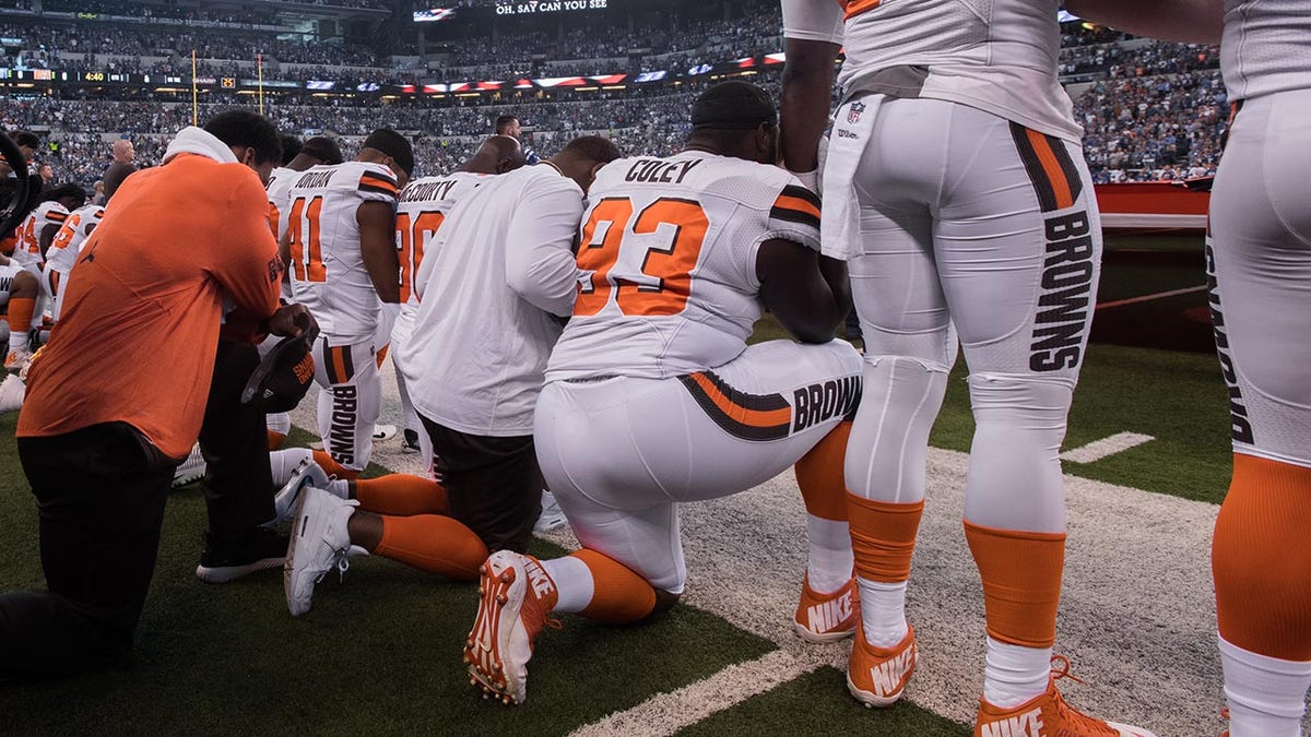 Browns players kneel