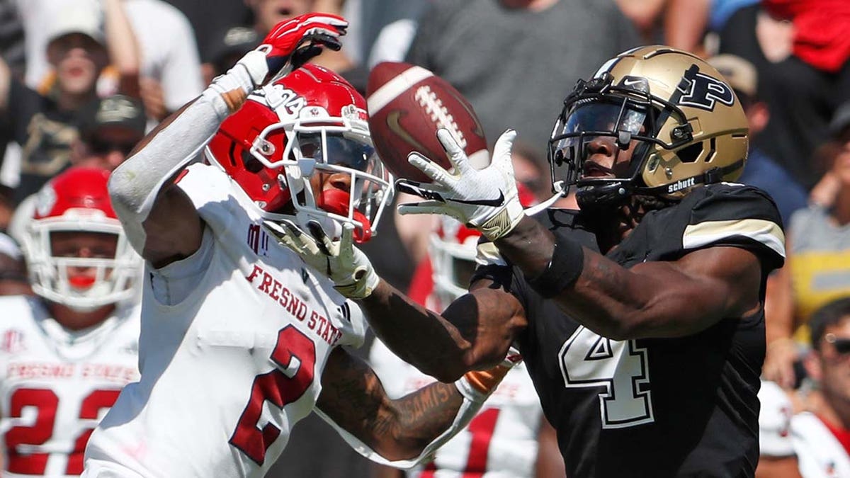 Deion Burks makes a catch during a game