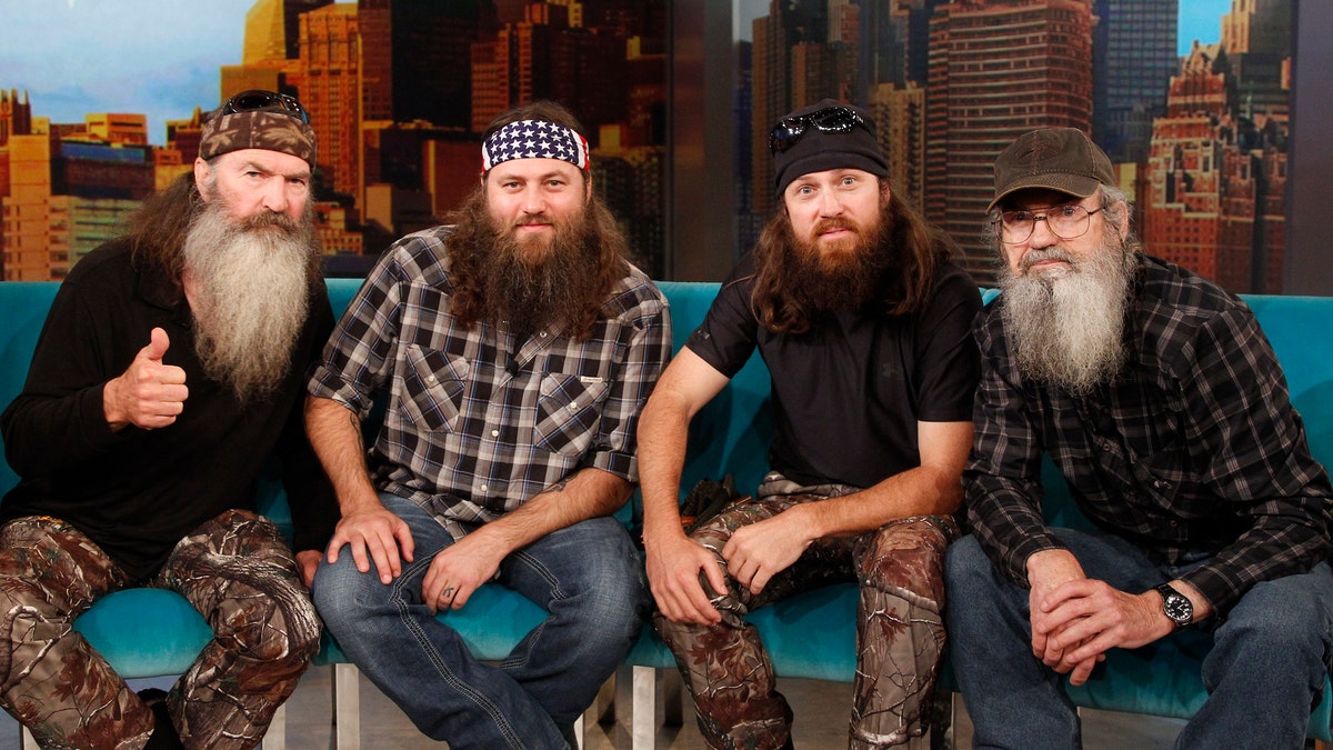 Phil Robertson, Willie Robertson, Jase Robertson, and Si Robertson sit together on The View