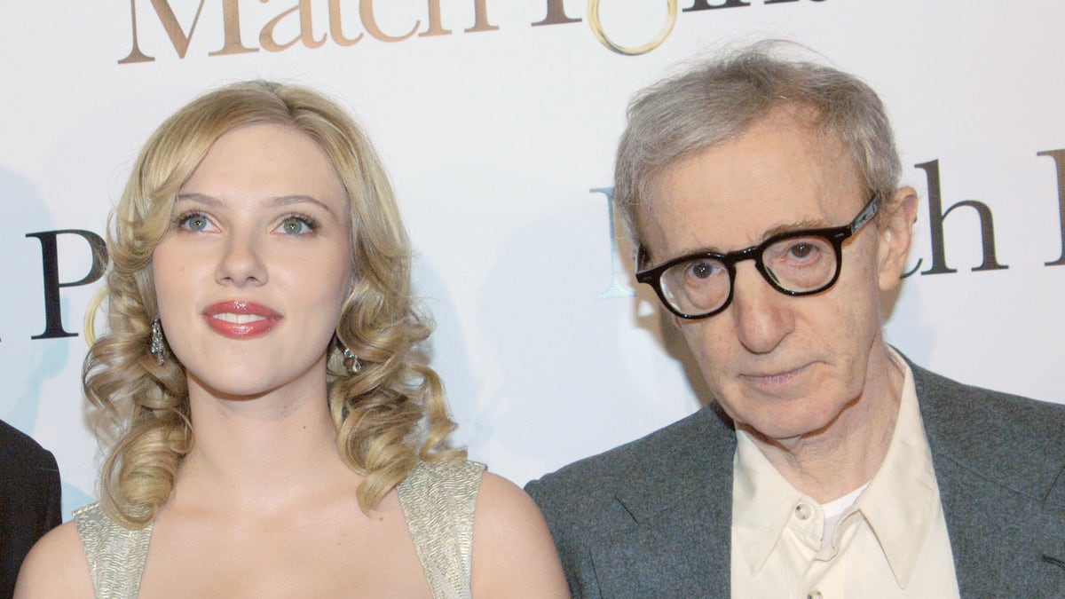 Scarlett Johansson posing with Woody Allen