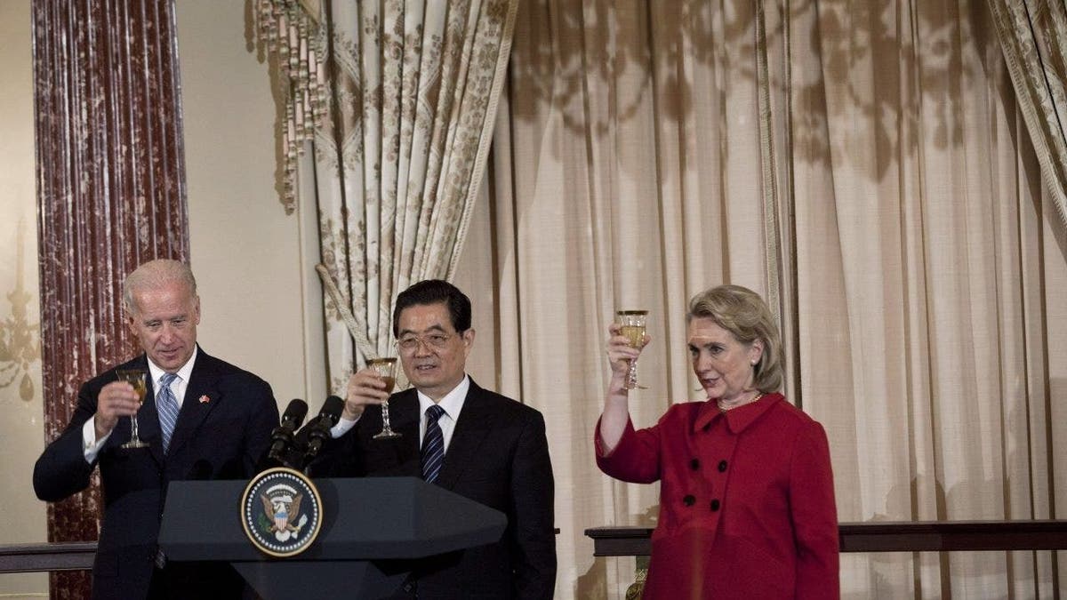 U.S. Vice President Joe Biden, Chinese President Hu Jintao and U.S. Secretary of State Hillary Rodham Clinton