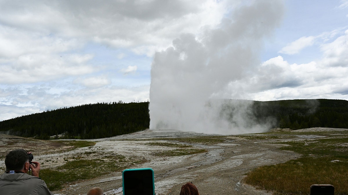 Old Faithful erupting 