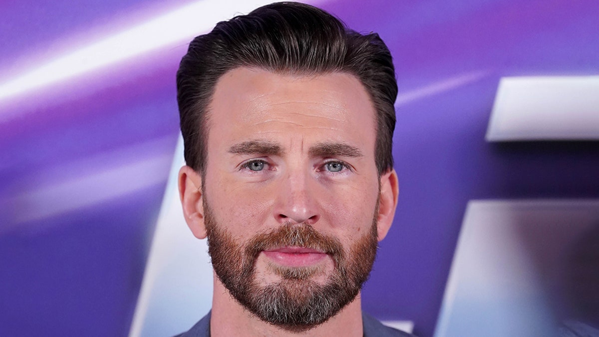 Chris Evans looks directly at the camera at the UK premiere of "Lightyear"