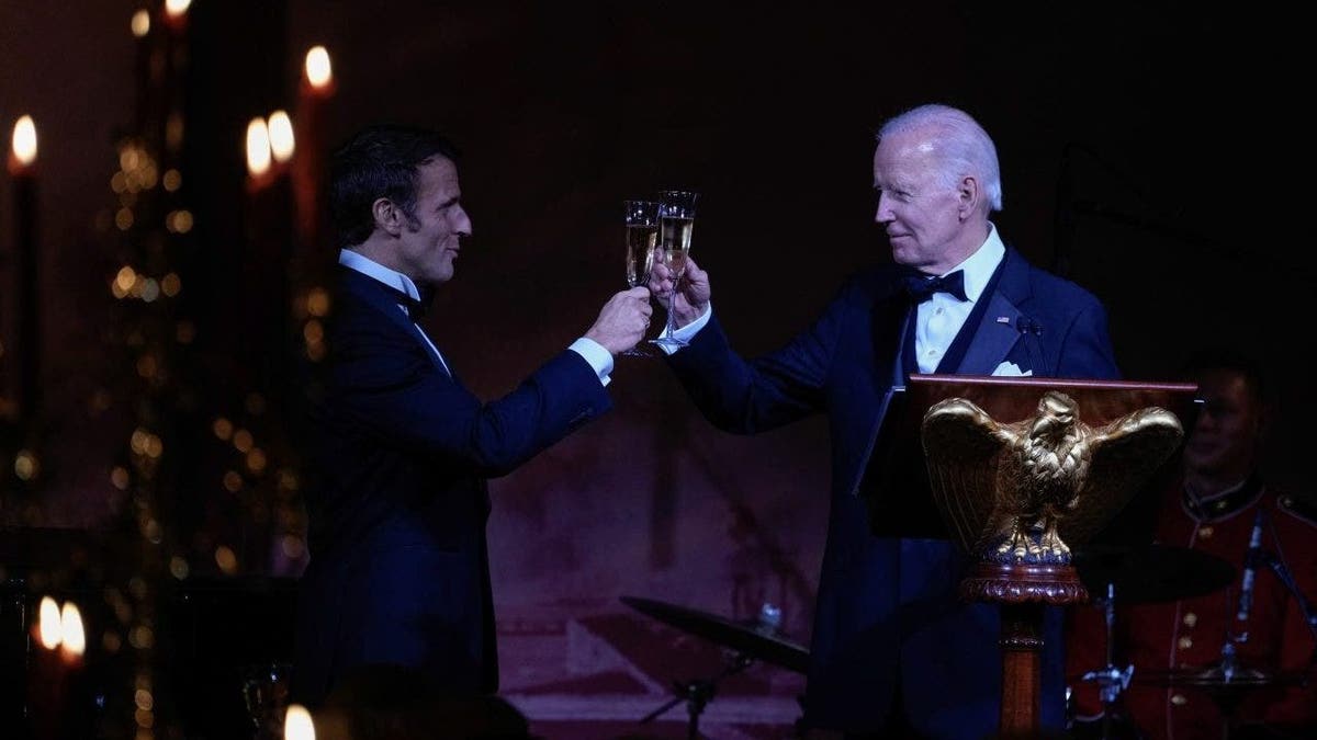 US President Joe Biden, right, and Emmanuel Macron, France's president