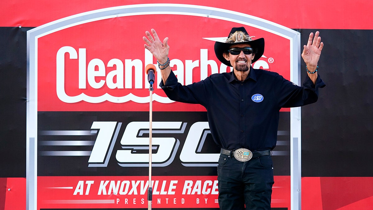 Richard Petty waves to fans