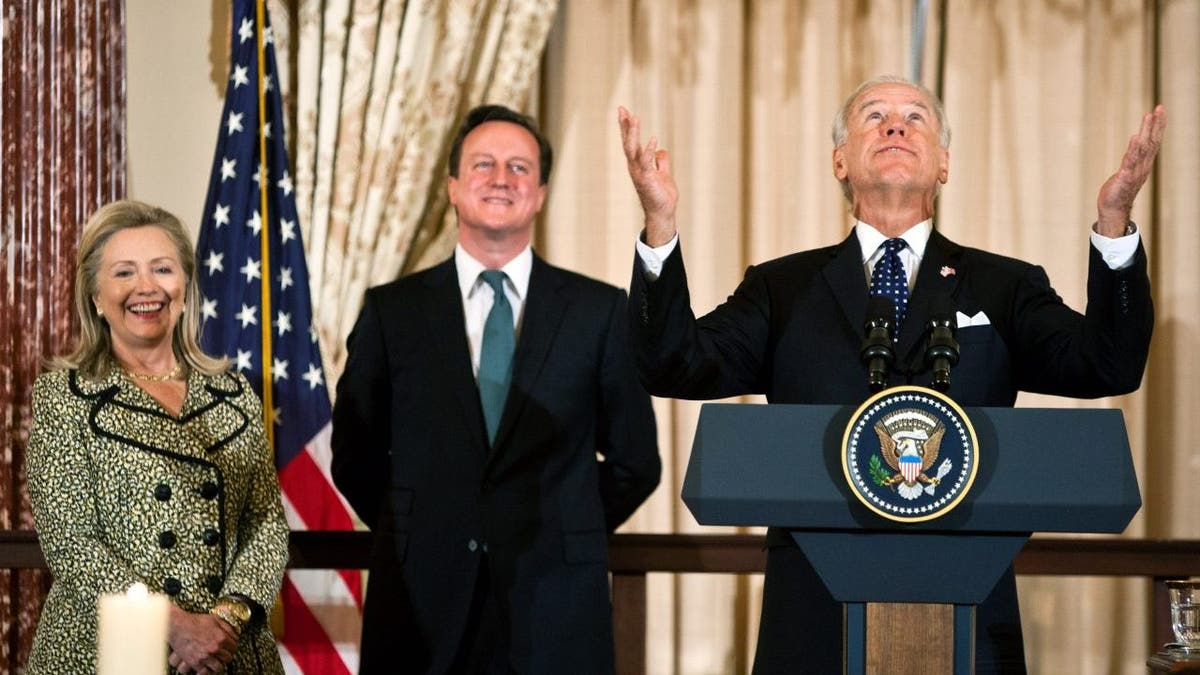 Secretary of State Hillary Clinton (L), British Prime Minister David Cameron, and Vice President Joe Biden (R)