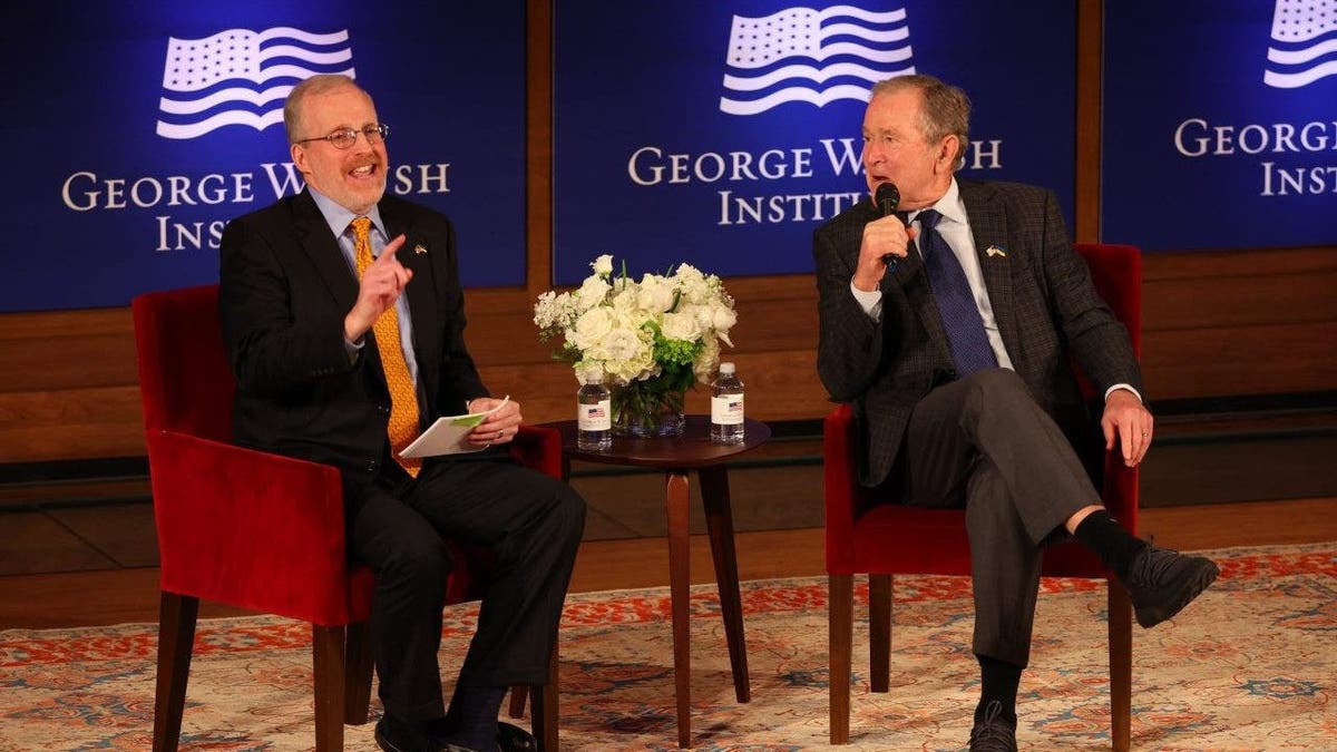 David J. Kramer and George W. Bush