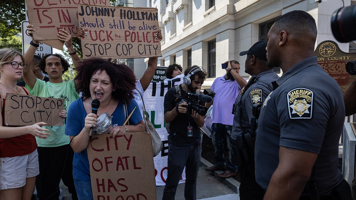 Cop City protesters at Trump indictment