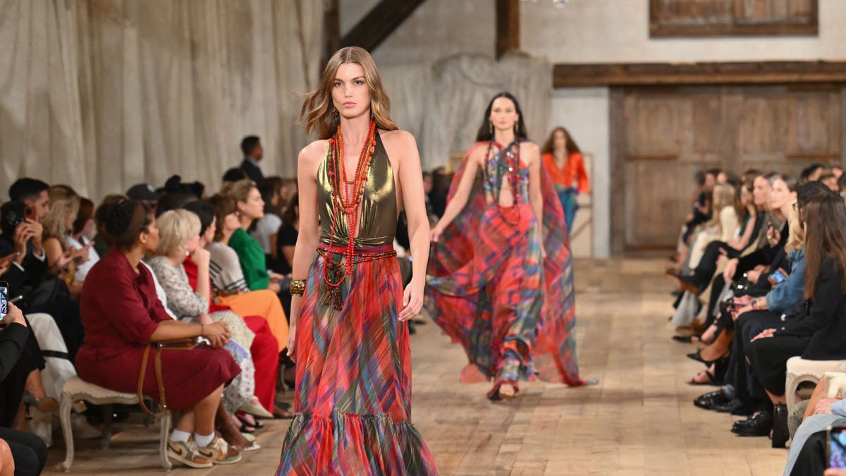 Models walk down the runway at the Ralph Lauren Spring Summer 2024 show in the Brooklyn Navy Yard 