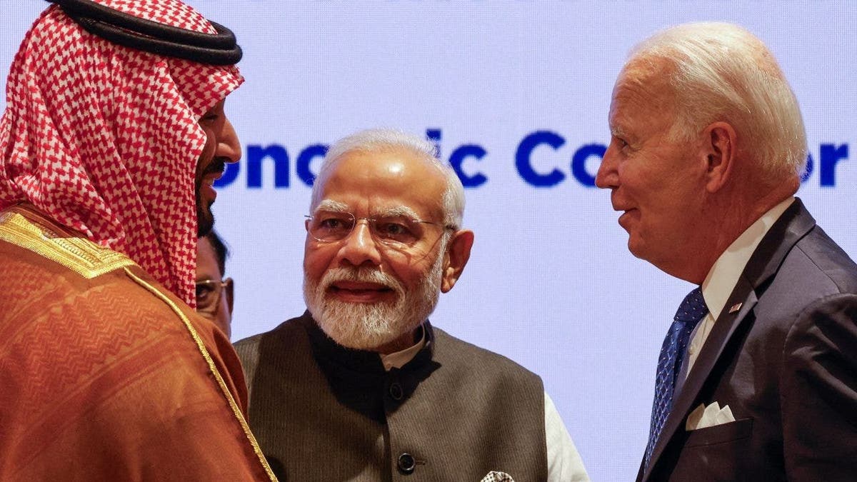 Mohammed bin Salman (L), India's Prime Minister Narendra Modi (C) and US President Joe Biden
