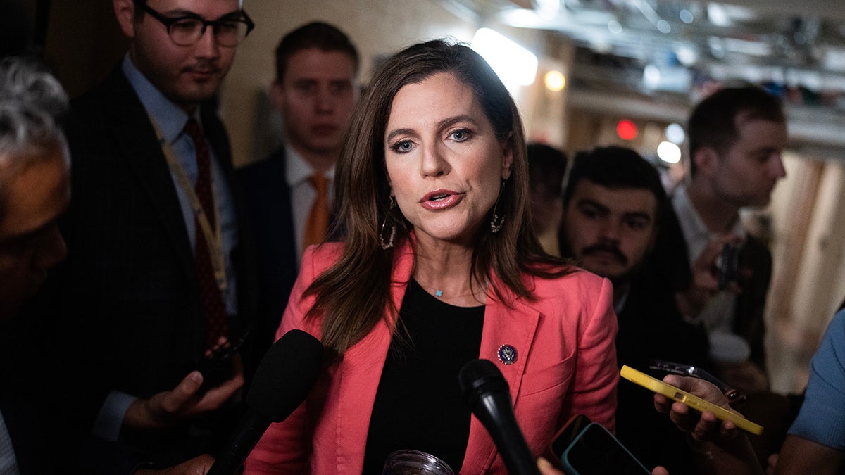 Nancy Mace surrounded by Capitol Hill reporters