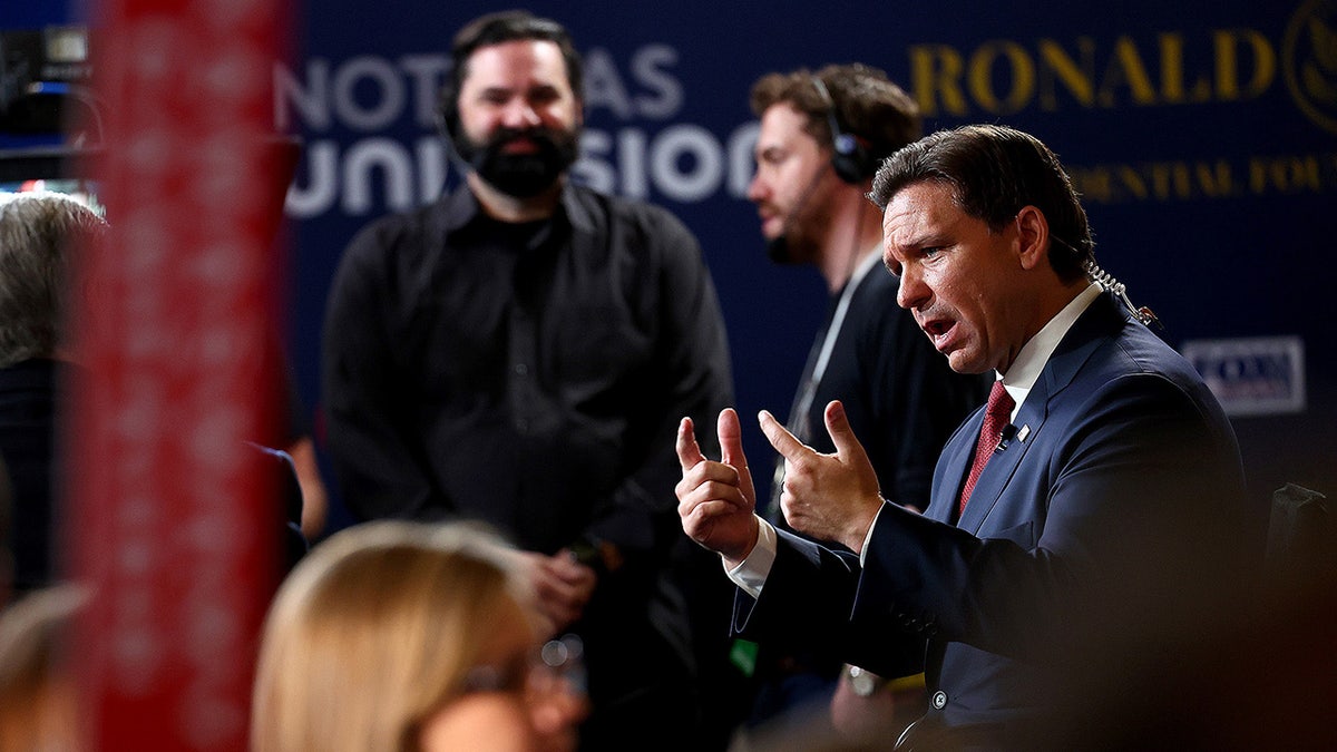 DeSantis talks to Hannity in the spin room