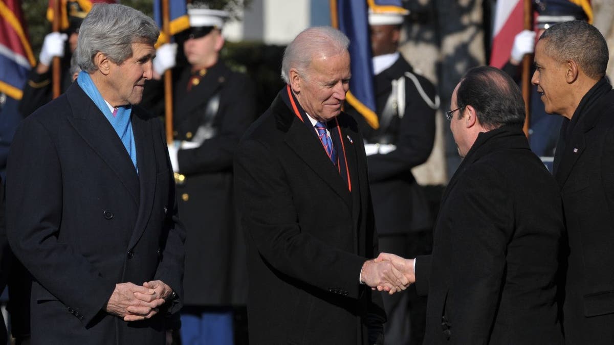 Vice President Joe Biden shakes hands with French President Francois Hollande