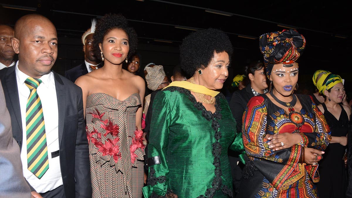 Winnie Mandela with Zoleka Mandela and others at birthday celebration