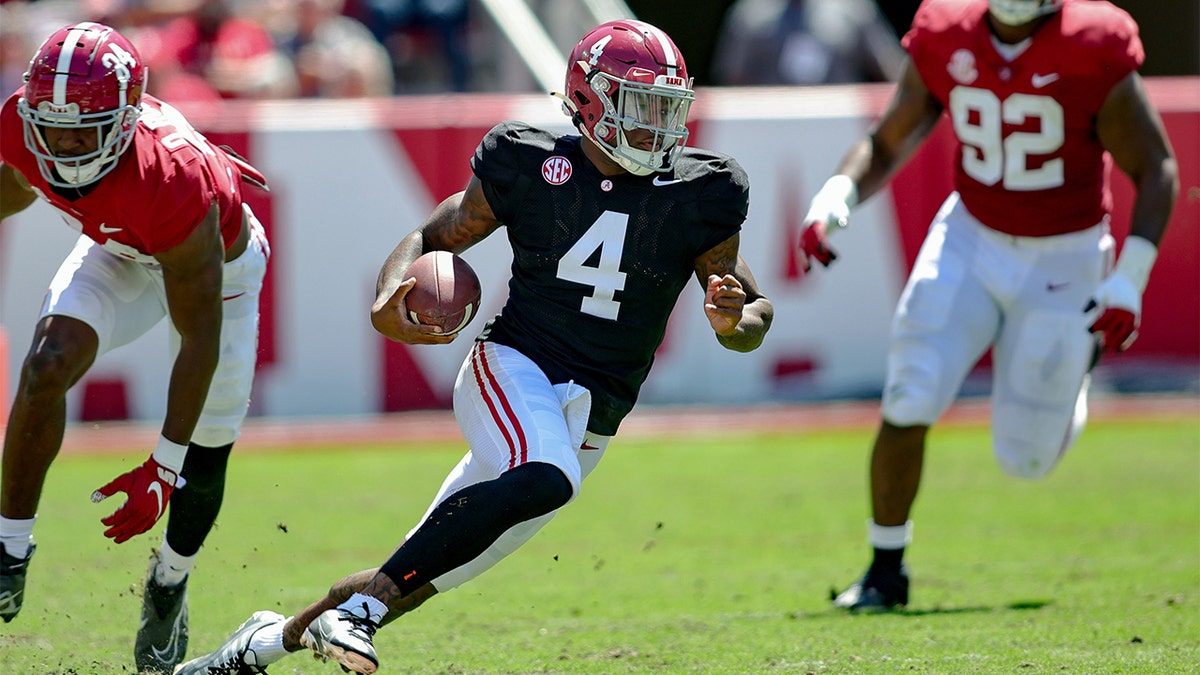 Jalen Milroe runs during the Spring Game