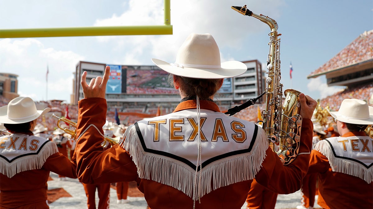 The Texas Longhorns Band takes the field