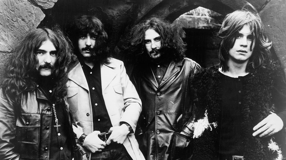 A black and white photo of the heavy metal band black sabbath