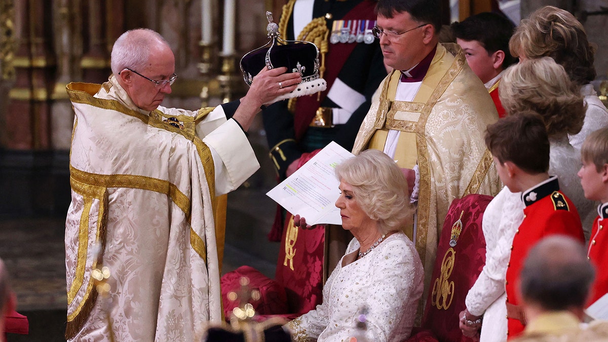 Camilla being crowned in church wearing white