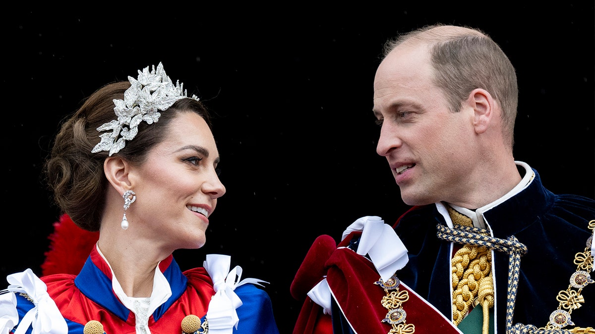 Close-up of Prince William and Kate Middleton admiring each other on the balcony of Buckingham Palace