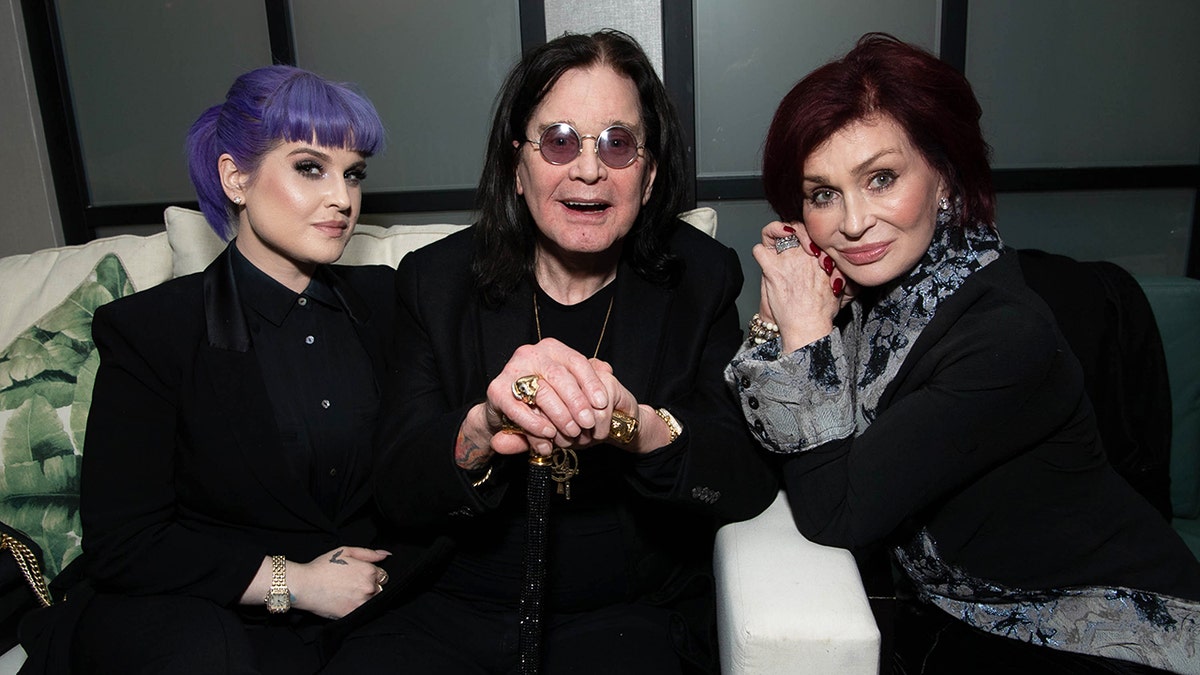 Kelly Osbourne, Ozzy Osbourne and Sharon Osbourne wearing various shades of black