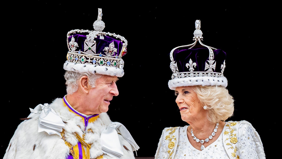 King Charles and Queen Camilla staring at each other during their coronation day