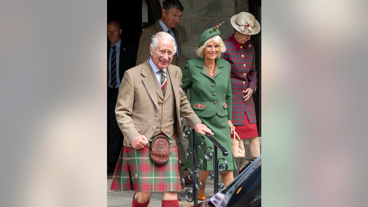 King Charles and Queen Camilla wearing traditional Scottish clothing