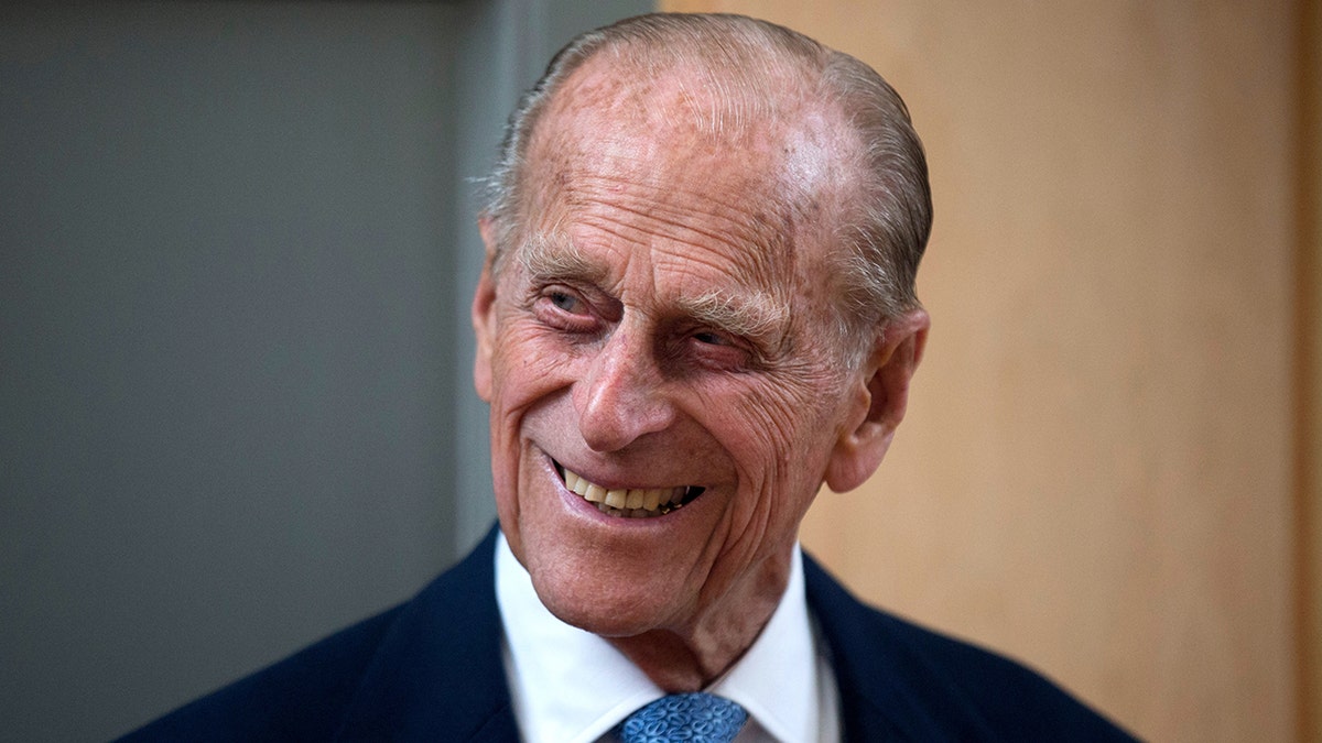 A close-up of Prince Philip in a suit and tie