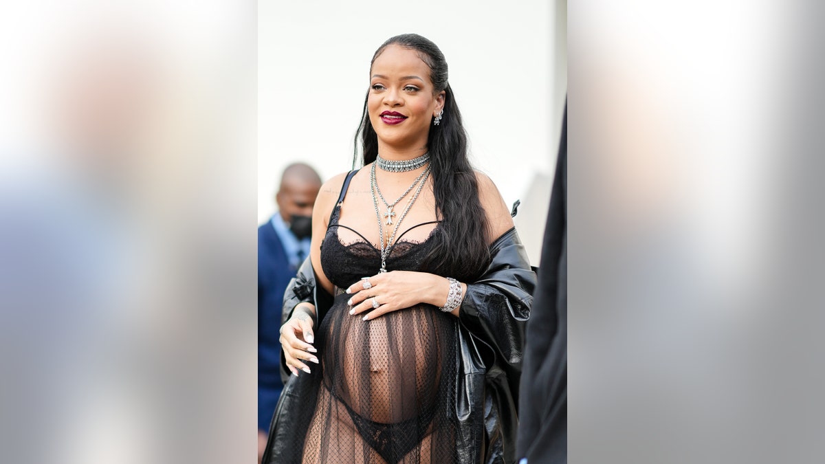 Rihanna wearing a sheer black dress while pregnant