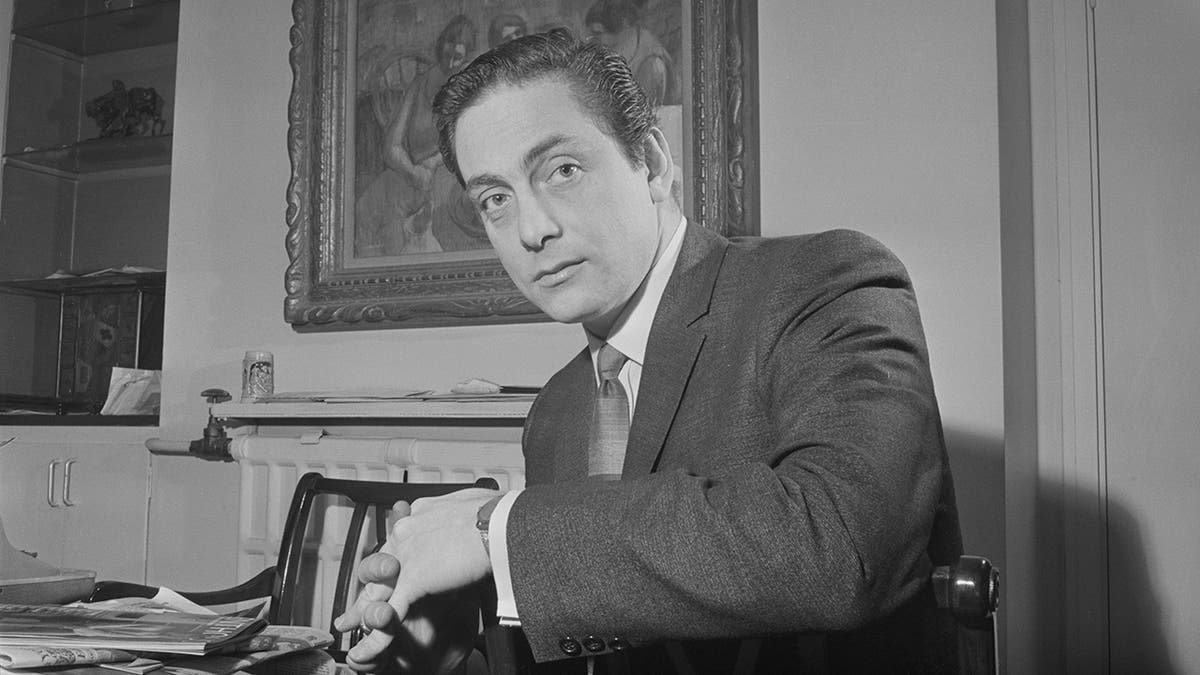 A young Bob Guccione in a suit