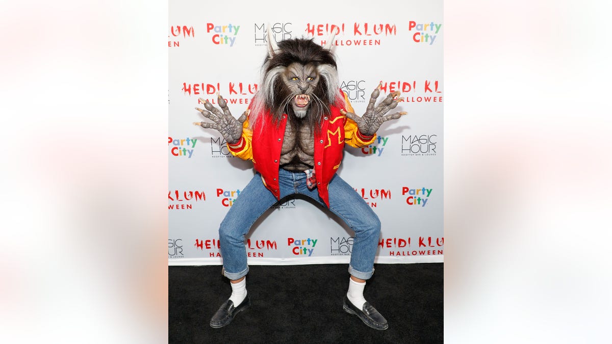 Heidi Klum dressed as a werewolf from Michael Jackson's "Thriller" music video