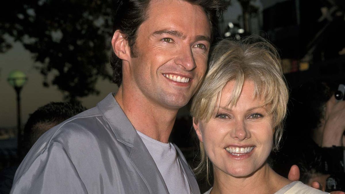 Hugh Jackman and Deborra-Lee Furness pose for a photo.