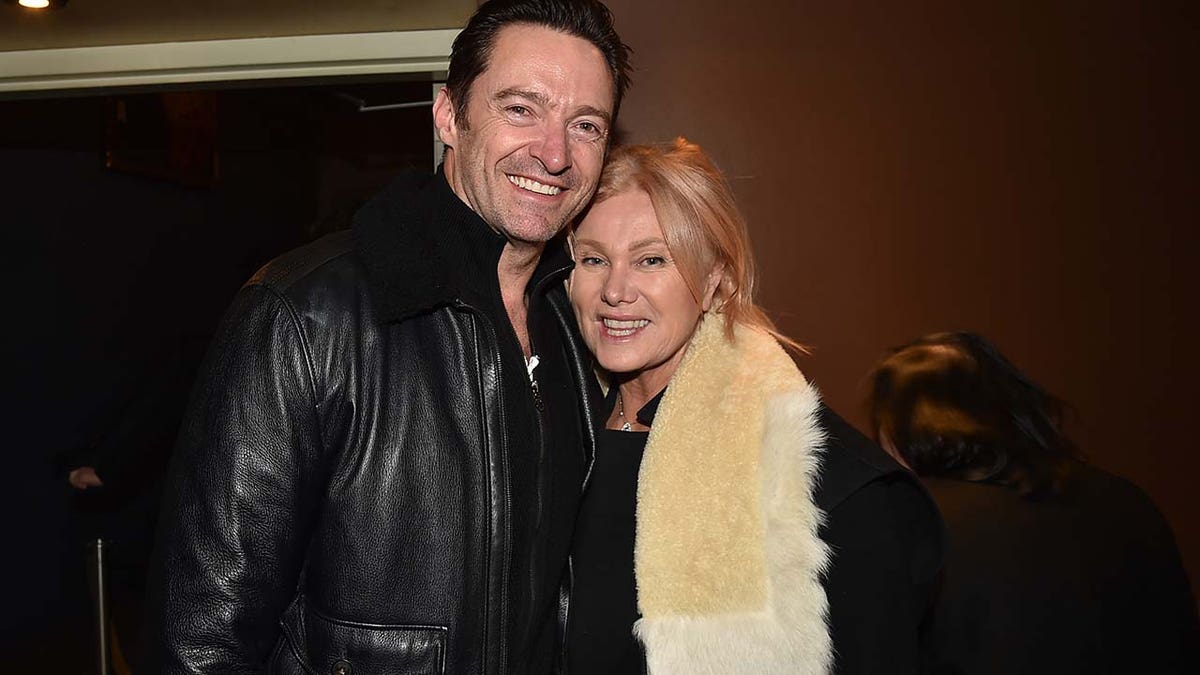 Hugh Jackman and Deborra-Lee Furness pose for a photo.