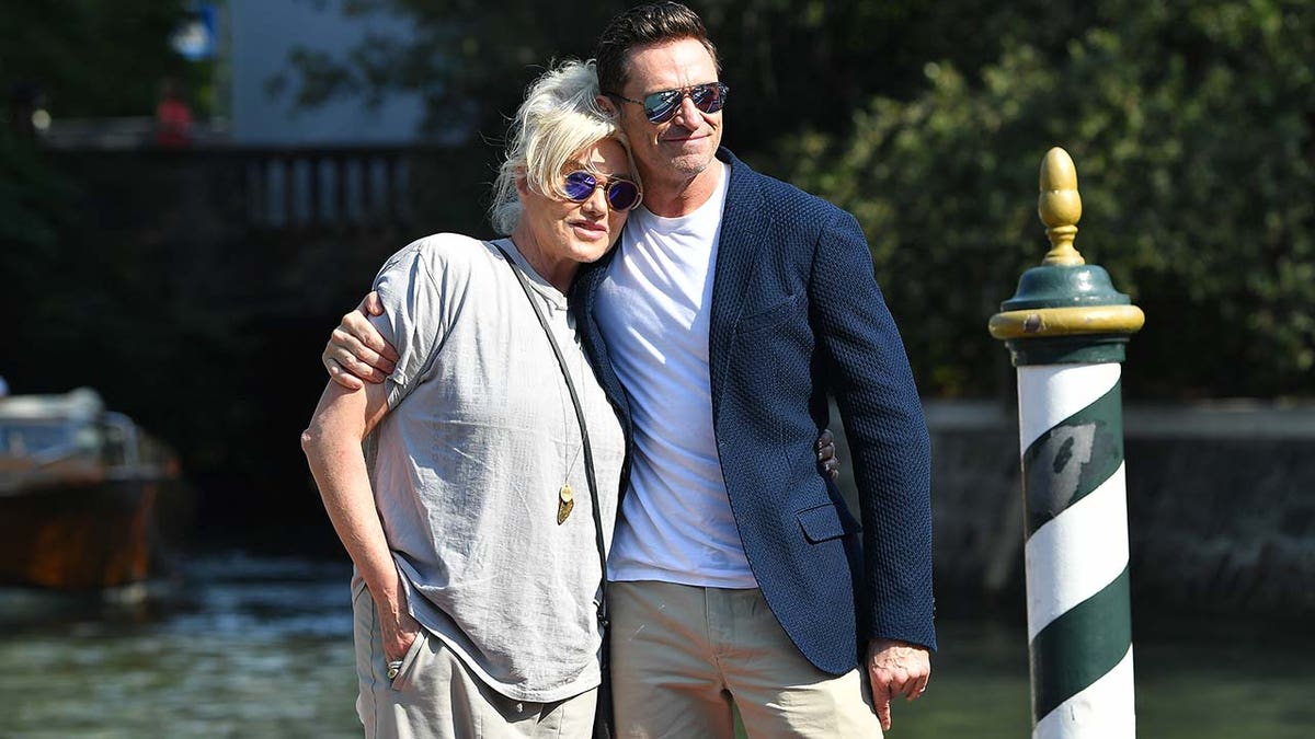 Hugh Jackman and Deborra-Lee Furness pose for a photo.