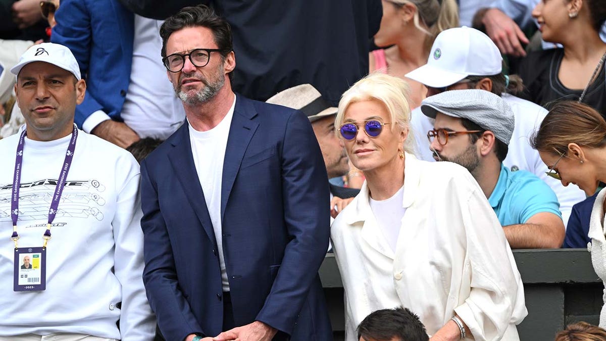 Hugh Jackman and Deborra-Lee Furness pose for a photo.