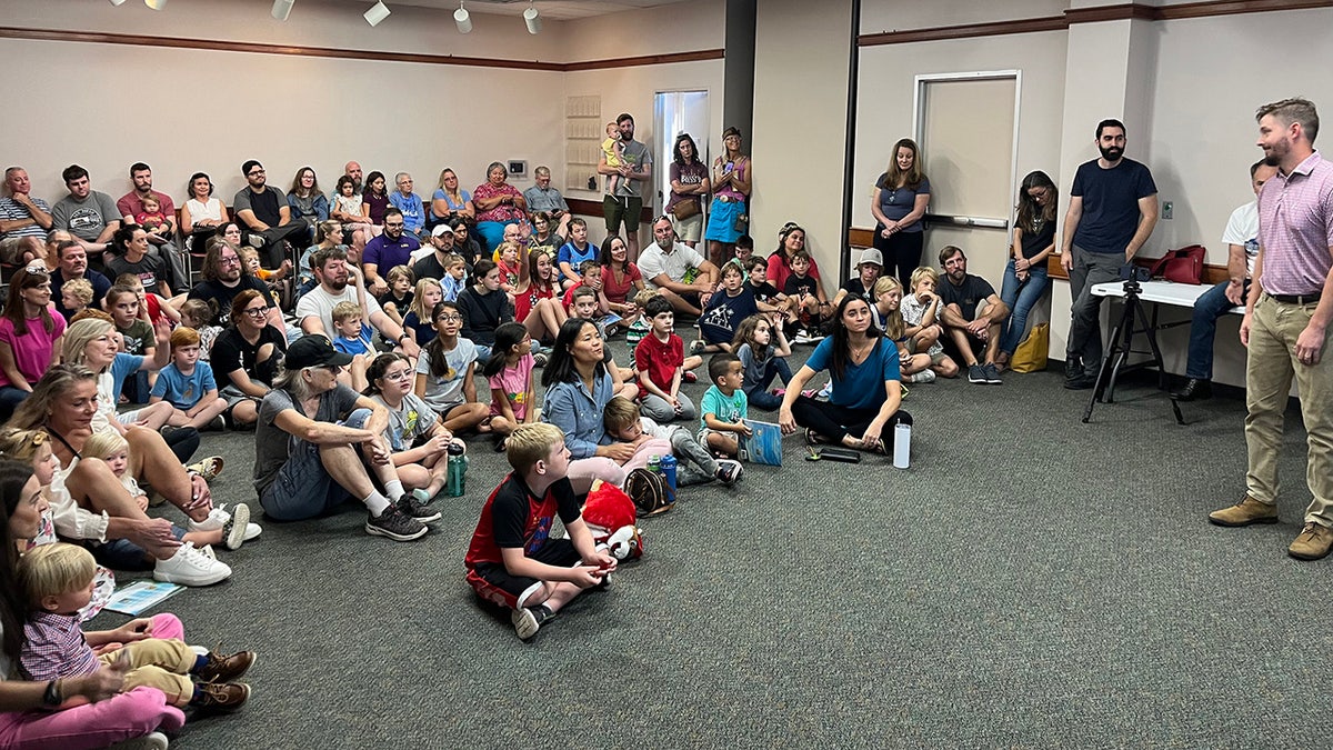 Crowd of children at library