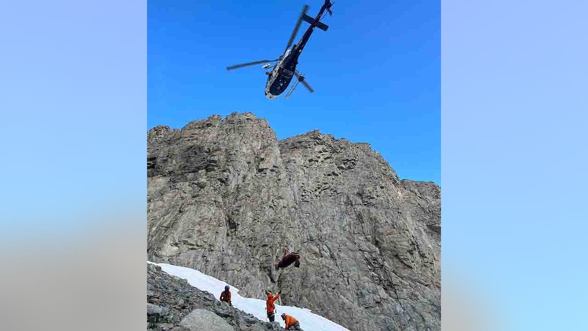 helicopter airlifting injured hiker