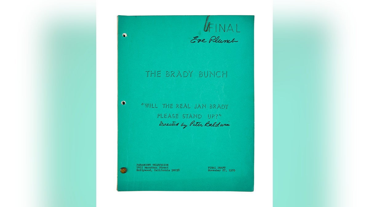 A green Brady Bunch script