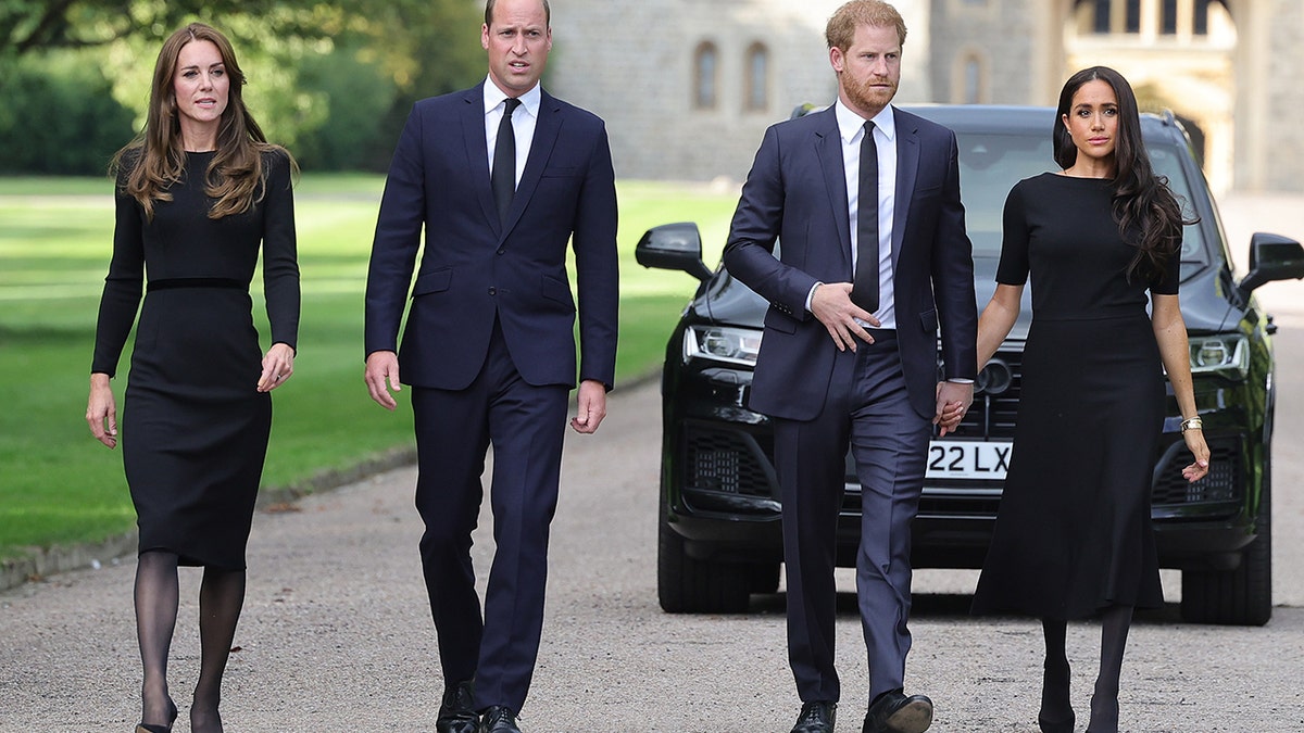 Kate Middleton, Prince William, Prince Harry, and Meghan Markle walk together