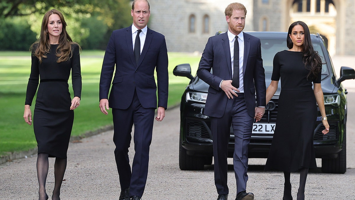 Kate Middleton, Prince William, Prince Harry, and Meghan Markle walk together