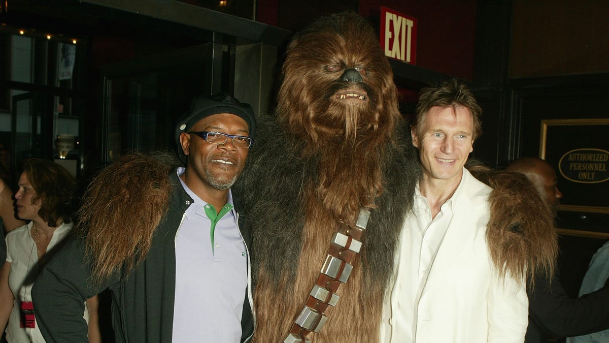 Samuel L. Jackson and Liam Neeson pose with Chewbacca